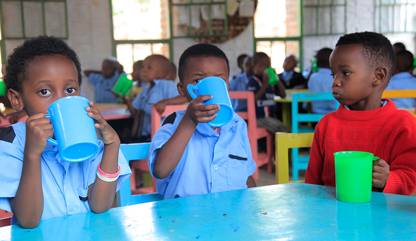 Children eat porridge at Mageragere Early Childhood Development Centre in Nyarugenge District, Kigali. File.