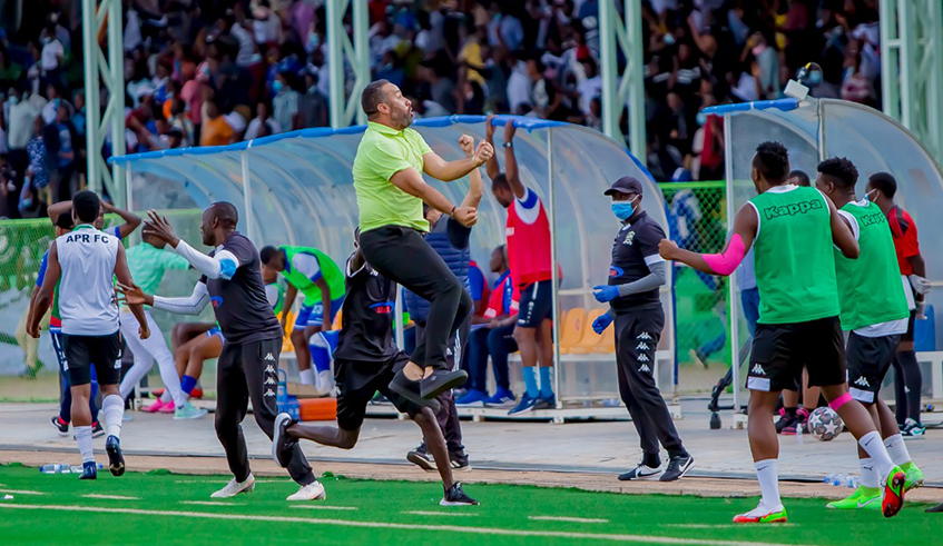 APR FC Head coach Adil Erradi Muhammed and players celebrate after the army side defeated Rayon Sports 2-1 at Kigali stadium on Tuesday. / Photo: Courtesy.