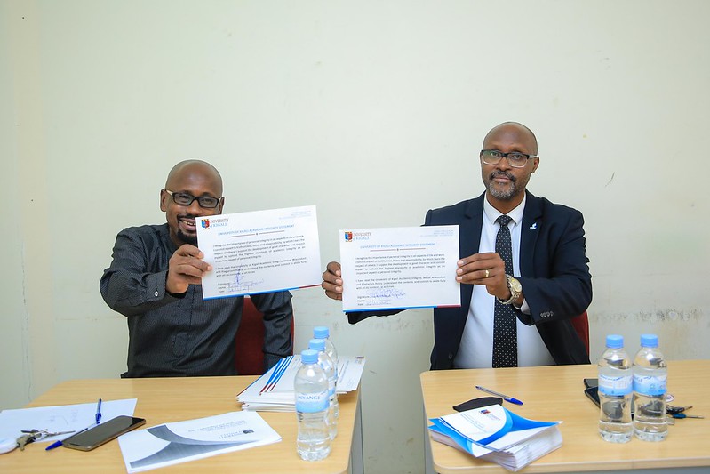 Prof. Robert E. Hinson deputy vice chancellor-Academic, Prof DR. TOMBOLA M. GUSTAVE vice-chancellor of University of Kigali after signing the academic integrity, sexual misconduct, and plagiarism policy on November 26. / All photos by Dan Nsengiyumva