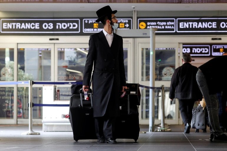 Israel is the first country to shut its borders completely in response to a new and potentially more contagious coronavirus variant. 