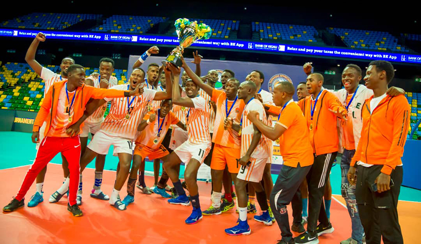 Gisagara Volleyball team players celebrate the trophy last week. / Courtesy