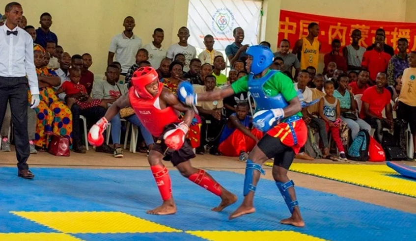 Two Kung Fu Wushu players in action during the just-concluded 2021 Kung Fu Wushu championship. / Photo: Courtesy.