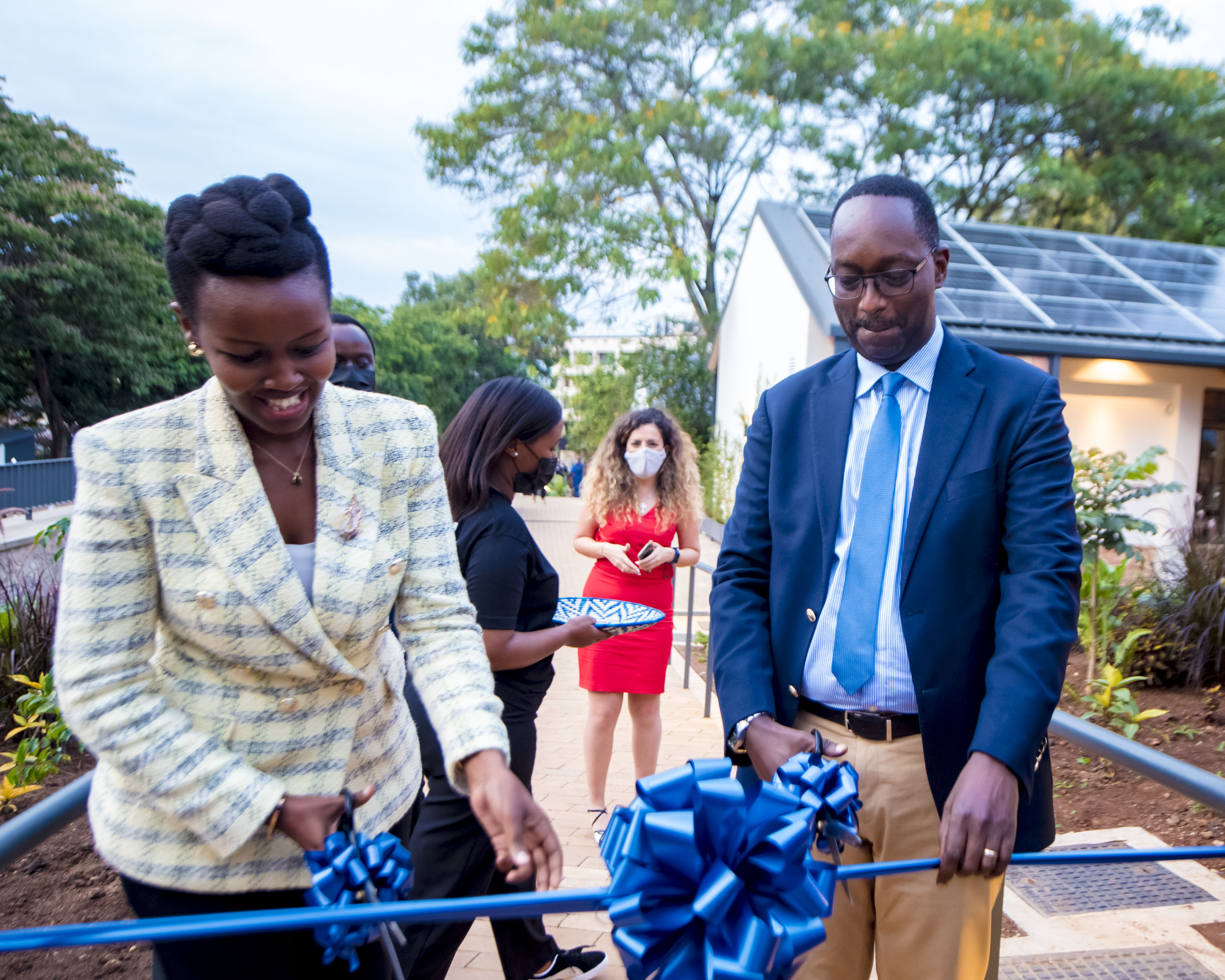 Paula Ingabire (L), the Minister of ICT and Dr. Daniel Ngamije, the Minister of Health cut the ribbon to luanch the healthtech hub in Kigali.