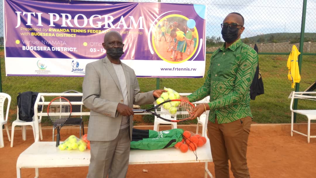 Theoneste Karenzi, the President of the Rwanda Tennis Federation (L) and Richard Mutabazi, the Mayor of Bugesera District (R) at the handover ceremony of the equipment that the federation provided to the schools in the district. / Courtesy