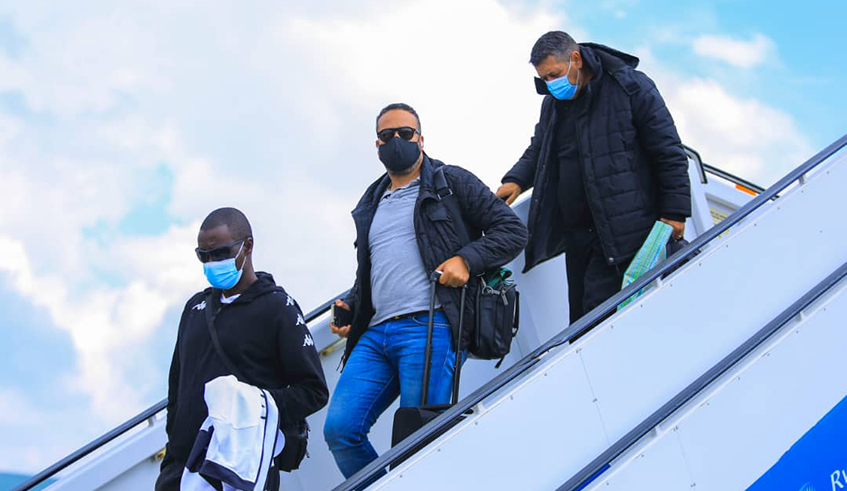 APR FC players and staff arrive at Kigali International Airport on December 6 after being eliminated from the CAF Confederation Cup. / Photo: Courtesy.