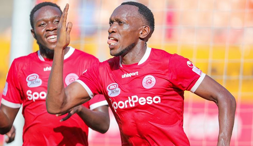 Rwandan international striker Meddie Kagere celebrates a goal with his teammate . / Courtesy