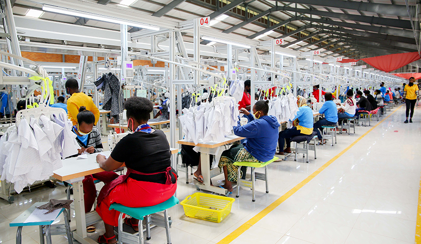 Tens of workers at Pink Mango garment factory in Kigali. Members of parliament on Monday December 6, raised their concerns over the rising rate of unemployment in the country. / Photo by  Dan Nsengiyumva