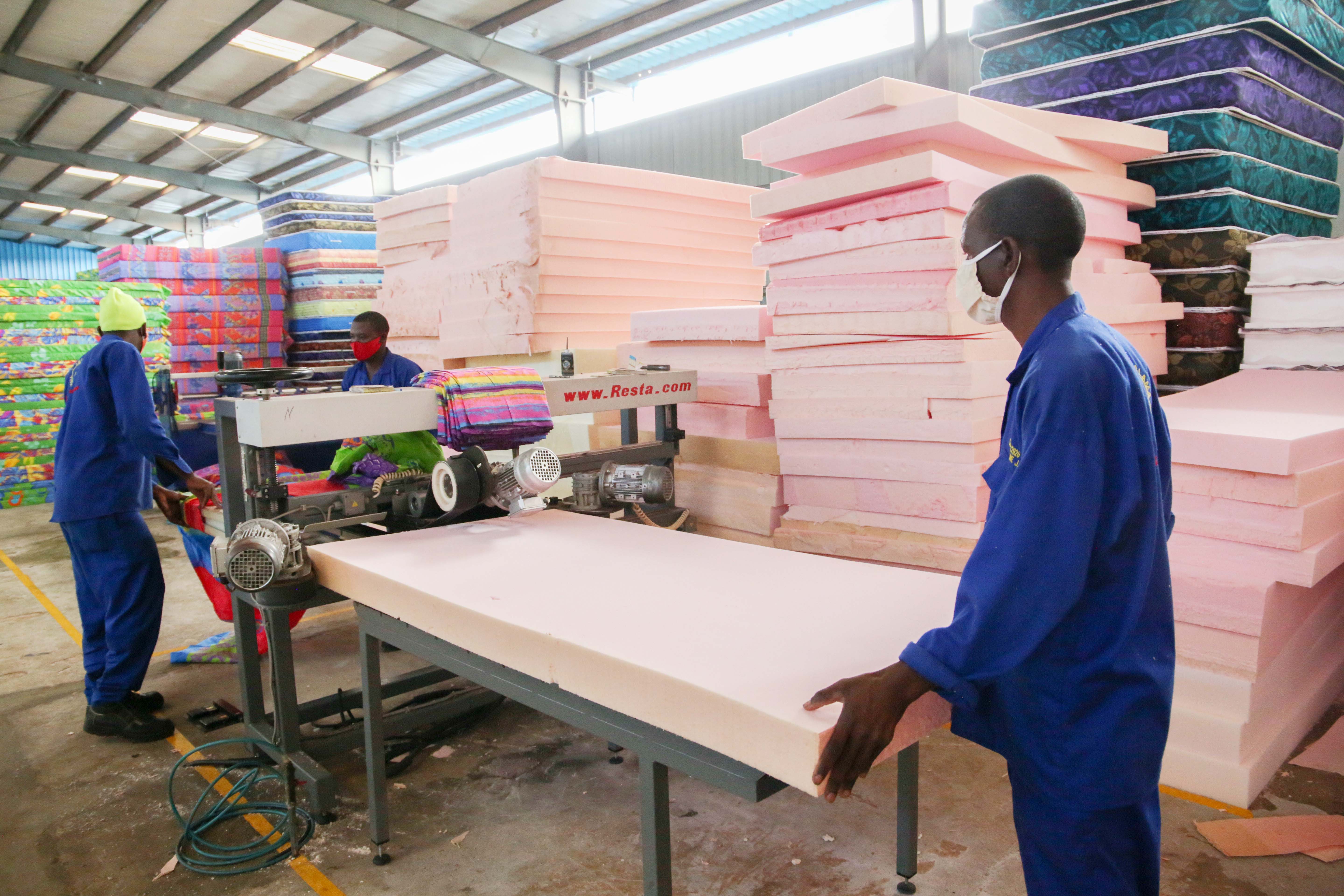 Workers on duties at Matelas Dodoma, one of mattress manufacturer  at Kigali Special Economic Zone. 