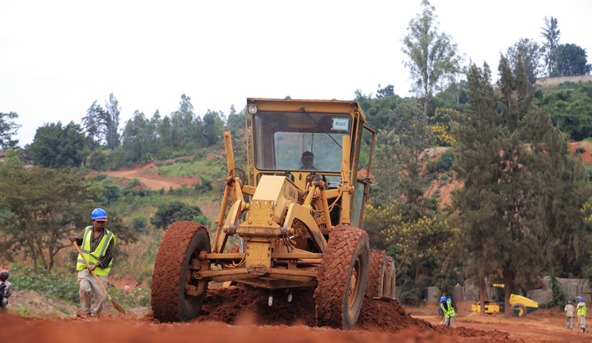 Workers during road construction activities in Gasabo District. The city of Kigali will have a length of 215.6 kilometres of roads constructed or upgraded in six phases by 2024. / Sam Ngendahimana