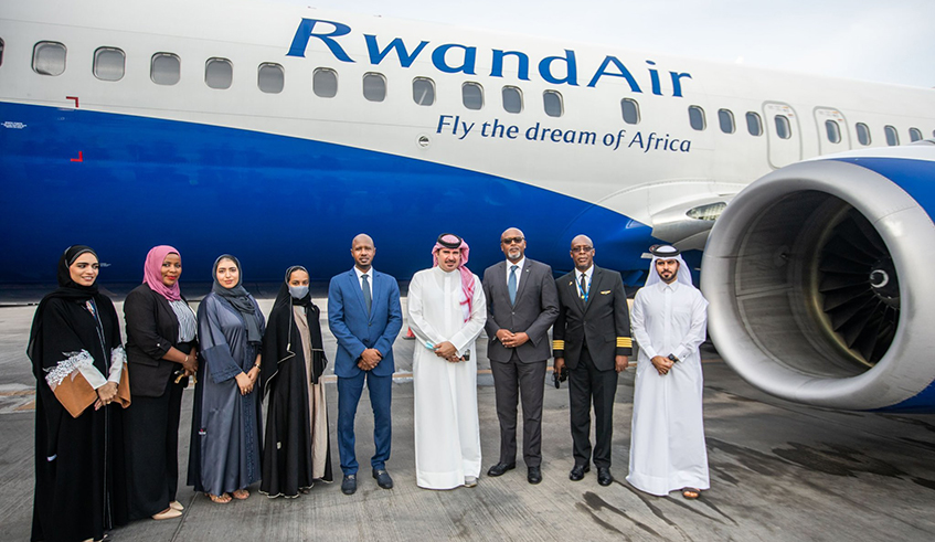 Ambassador of Rwanda to Qatar Francu0327ois Nkulikiyimfura and  officials pose for a group photo as they welcome Rwandair's first flight to Doha,Qatar  on December 2. Courtesy