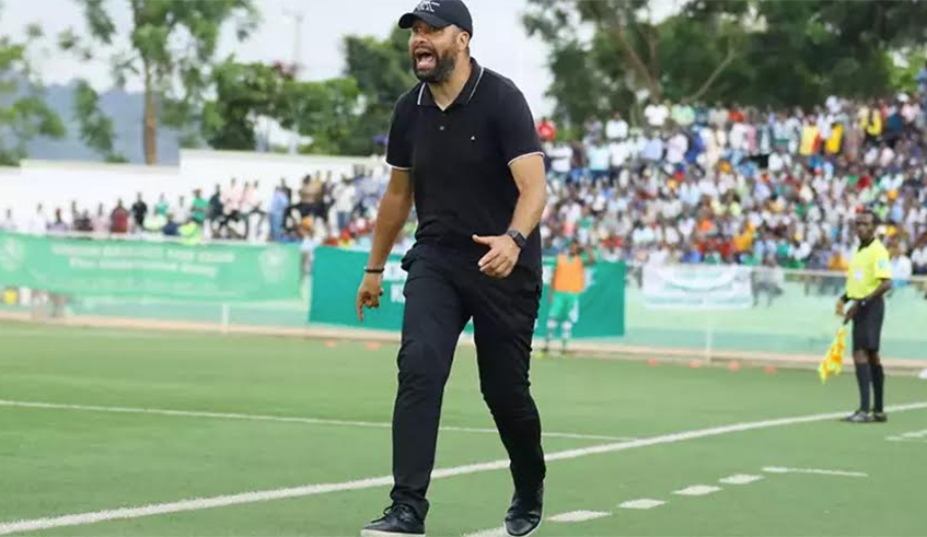APR FC Coach Mohamed Erradi Adil gives instructions to his players in a past match. / File