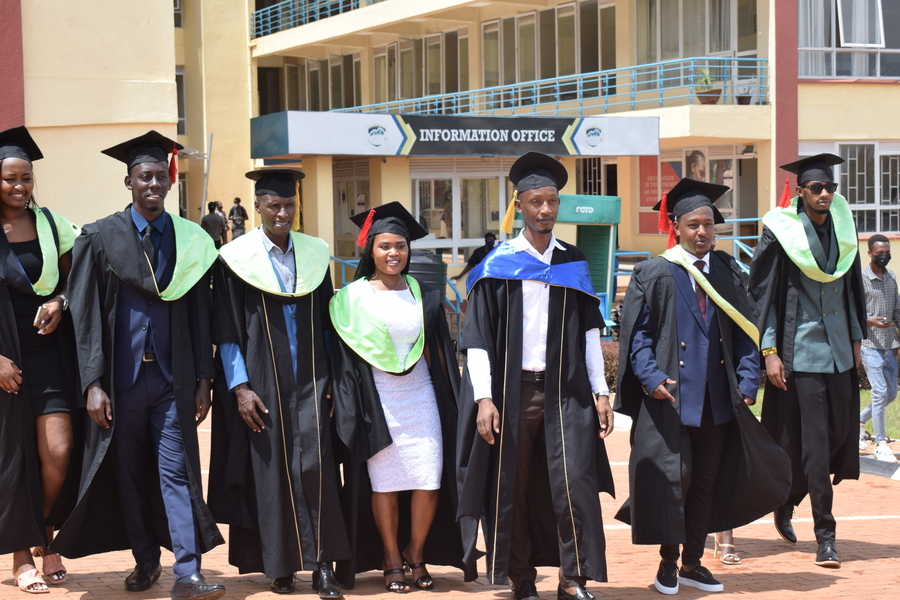 Some of the graduates enjoy their success at the Rwanda Campus.