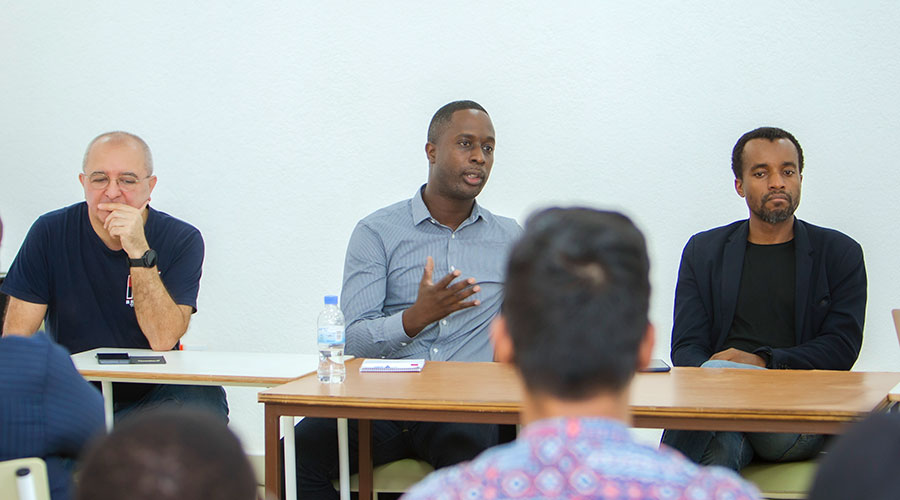  Serge-Armand Noukoue (c), the Film and Media Attachu00e9 for East Africa at the French Embassy in Kenya and Somalia, speaks during a past workshop. 