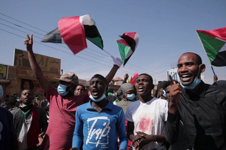 People take part in a protest against the October military takeover in Khartoum. 