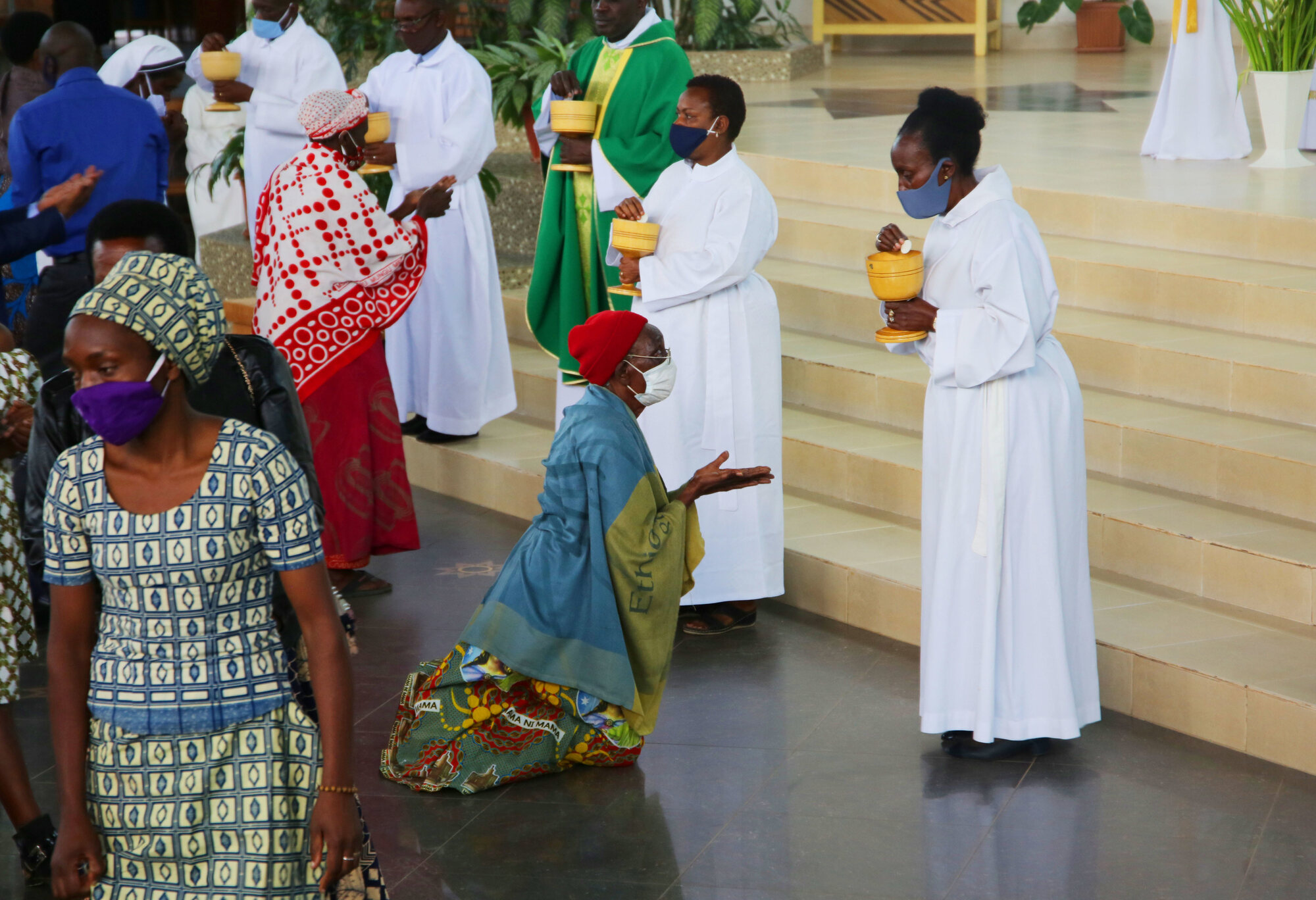 Christians during holy communion at Regina Pacis in Remera. 