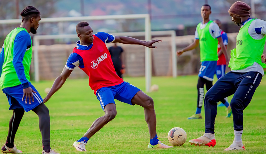 Rayon Sports players during a training session at Nzove play ground last week . Courtesy