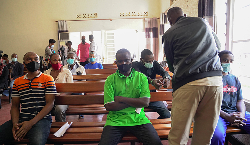 Some of the 13 suspects linked to Allied Democratic Forces (ADF) at Kicukiro Primary Court on Monday, December 20. / Photo: Dan Nsengiyumva.