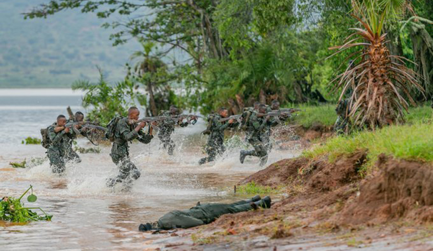 Course participants during a simulated combat exercise at their pass out at the RDF Basic Military Training Centre in Kirehe District
