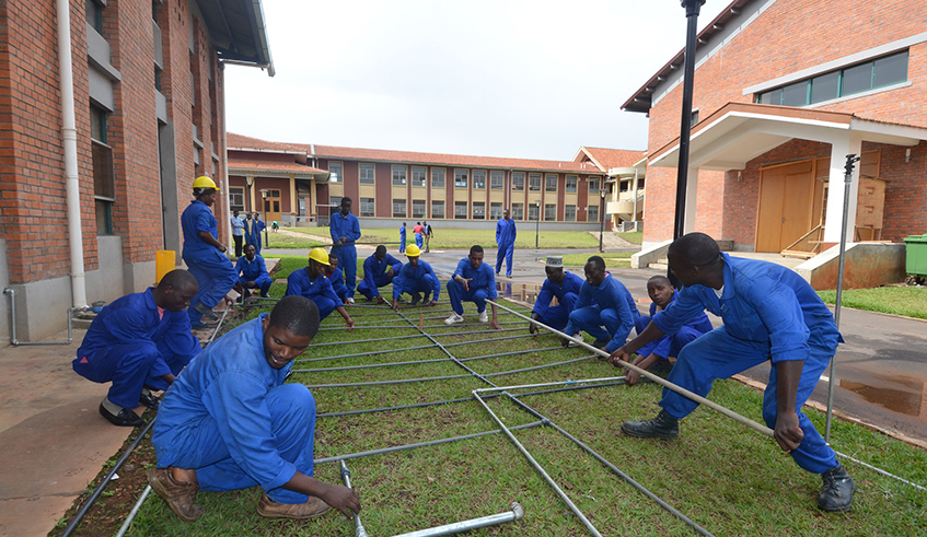 Students during a plumbing exercise at Musanze Polytechnique . / Sam Ngendahimana