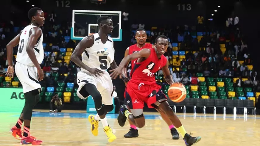 Nshobozwabyosenumukiza (with the ball) during a previous league match against Patriots at Kigali Arena. The 22-year-old set a world record for steals in the Afrobasket tourney this year. 