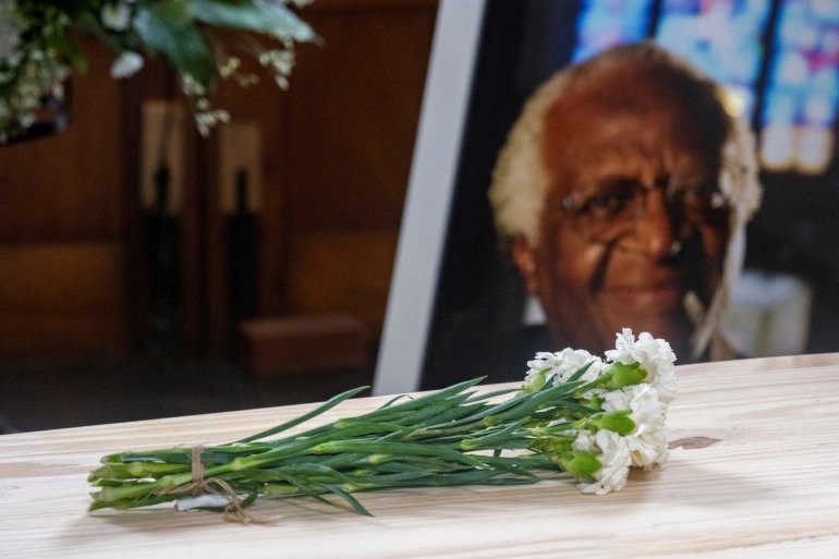 Flowers are laid over the coffin of the late Archbishop Desmond Tutu during the state funeral at St George's Cathedral in Cape Town, South Africa. 