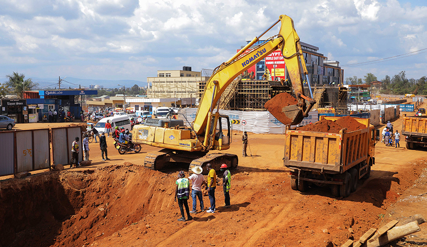 A tractor works at the ongoing construction works to upgrade Kicukiro Gahanga -Akagera road on December 6, 2021 . A total of 46 cases of complaints regarding expropriation arrears were reported to the ombudsmanu2019s office in the fiscal year 2020-2021. / Dan Nsengiyumva