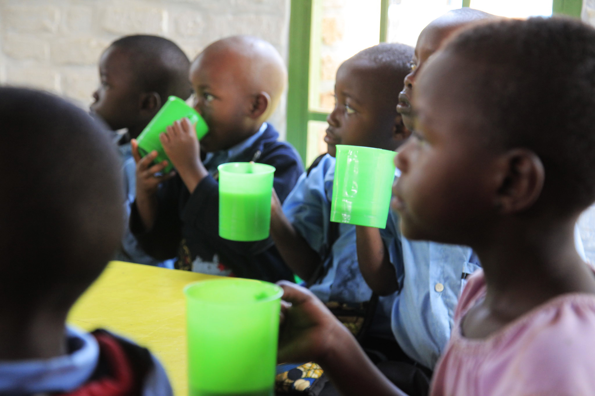 Children take porridge at an Early Childhood Development Centre on June 28, 2021. 