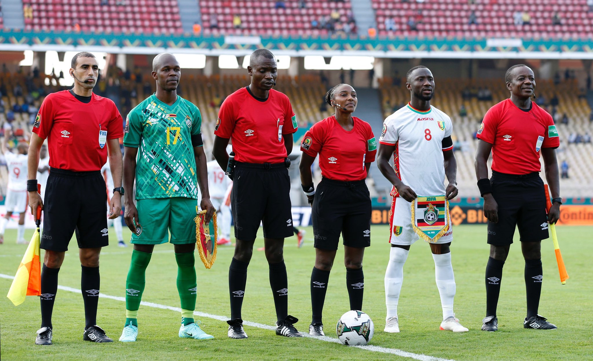 Salma Mukansanga (3rd-R) is a nurse by training. She was also a match official at the Tokyo 2020 Olympics last year. 