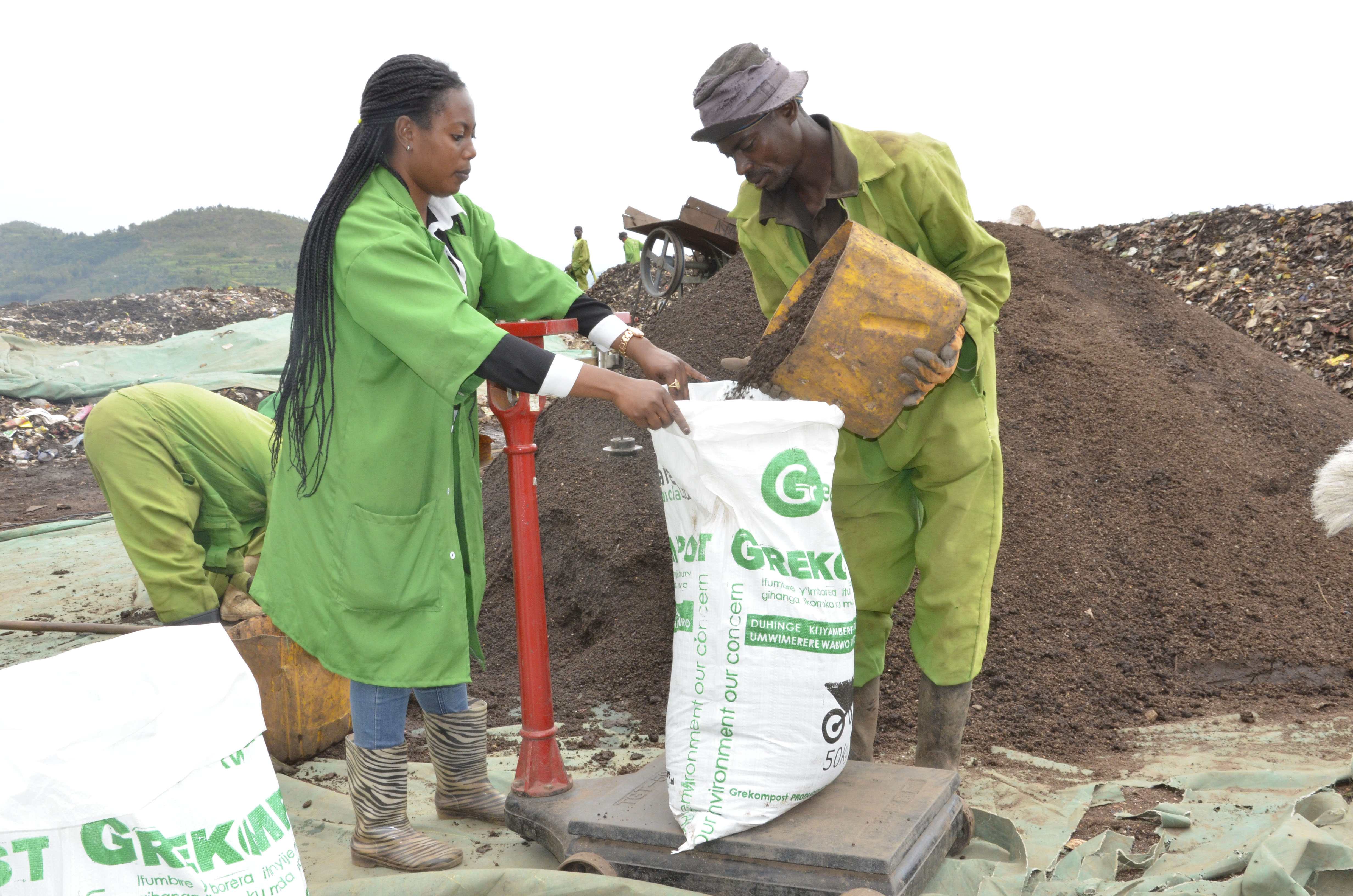 Composted manure made from biodegradable waste by Greencare Rwanda Ltd being packaged in Huye District. This is one of the practices in line with agroecology. Courtesy