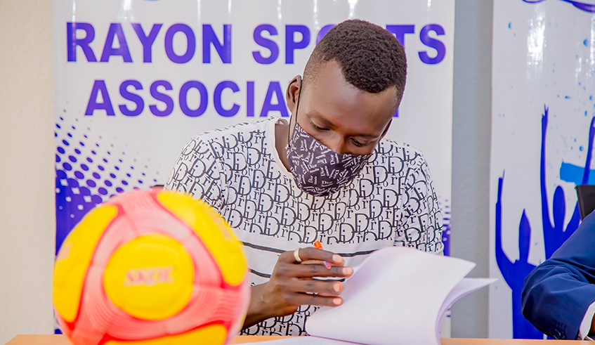Ugandau2019s Musa Esenu signs a two year deal after joining Rayon Sport on Wednesday, January 25. / Photo: Courtesy.