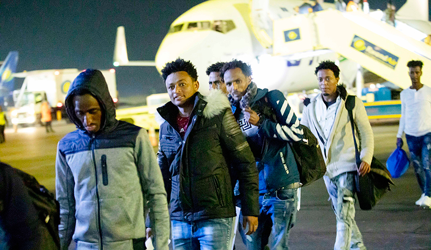Asylum seekers who were evacuated from Libya  arrive at Kigali International Airport in  Rwanda on November 24, 2019. / File