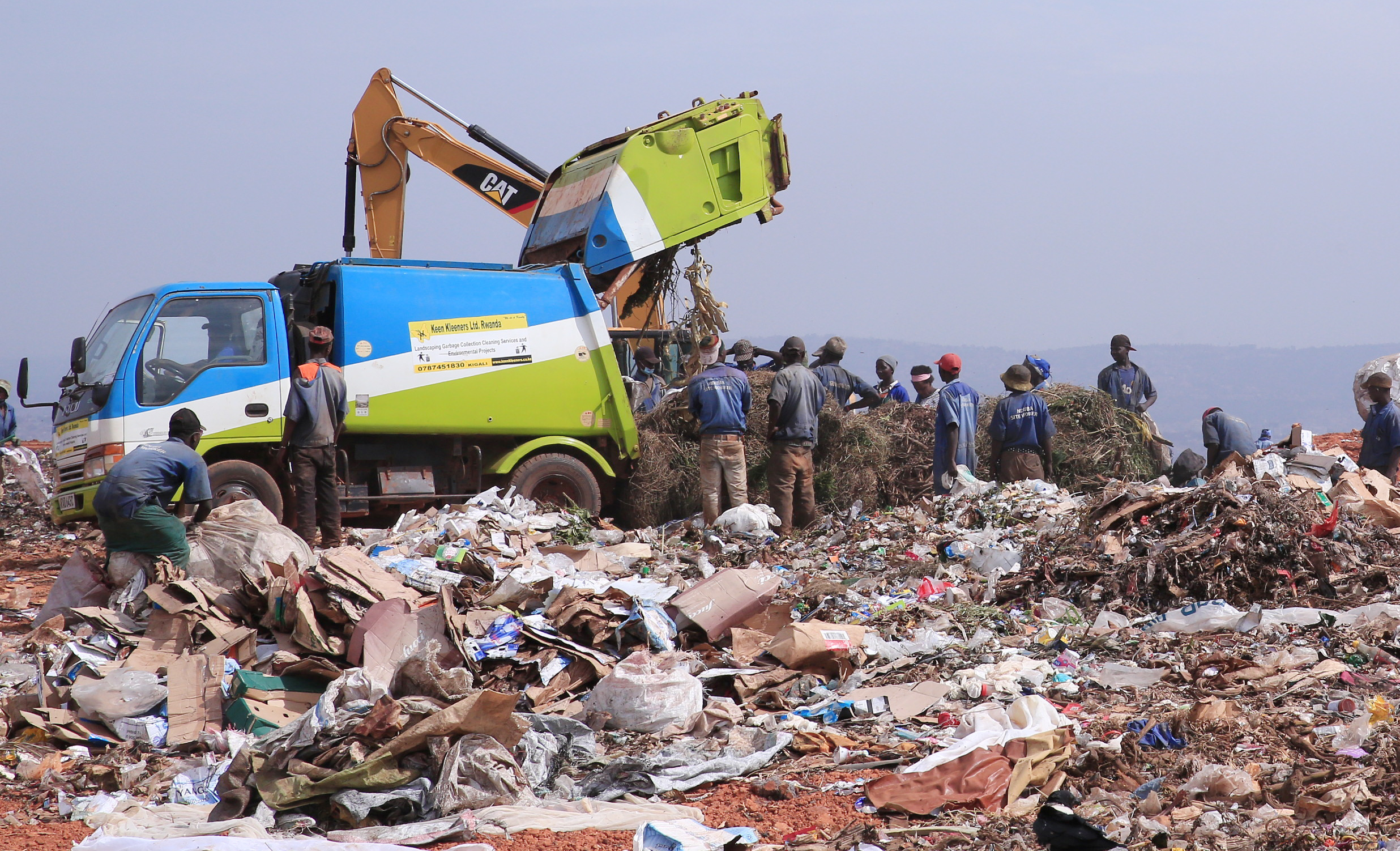 Workers sort garbage at Nduba landfill in Gasabo District. At least 70% of waste in Kigali will be converted into fertilizers. 