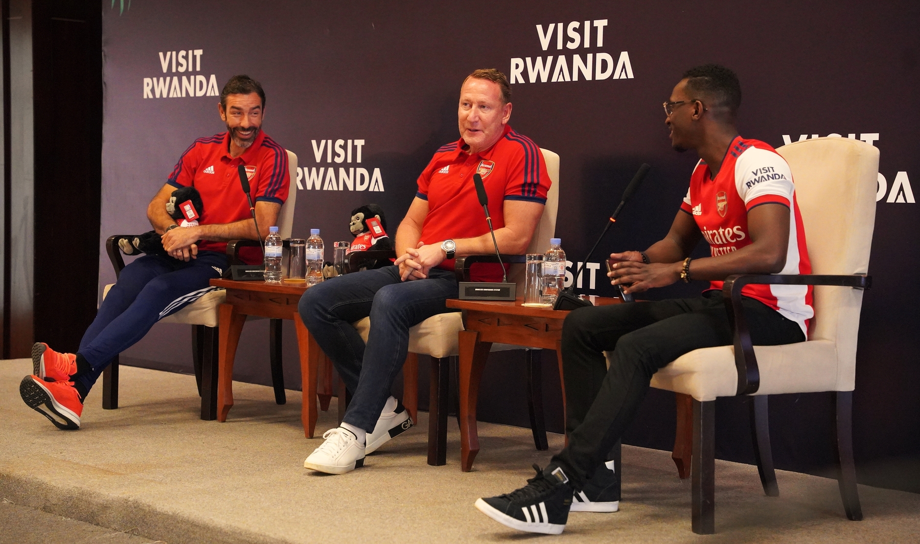 Robert Pires (L) and Ray Parlour (C) met with Arsenal fans, and were received by President Paul Kagame on Wednesday. They also trekked the mountain gorillas on Tuesday. 