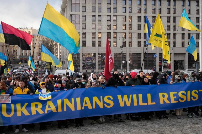 Ukrainians attend a rally in central Kyiv against Russian aggression. 