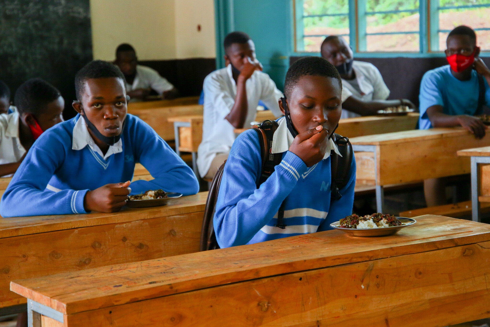 Students having lunch at Groupe Scolaire Kimironko II on November 16, 2020. MINEDUC will receive Rwf5bn in additional funding to be able to sustain the school feeding. 