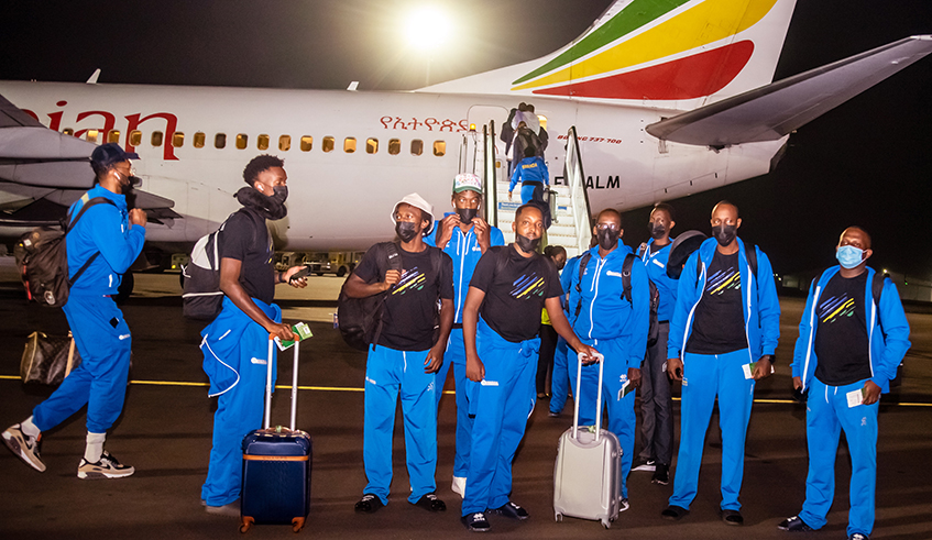 The national basketball team poses for a group photo after arriving in Dakar, Senegal on Saturday night. / Courtesy 