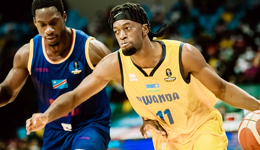 Rwanda national team power forward Axel Mpoyo during Afrobasket game against DRC. He is among 5 new players that REG has added to the squad  (Courtesy)