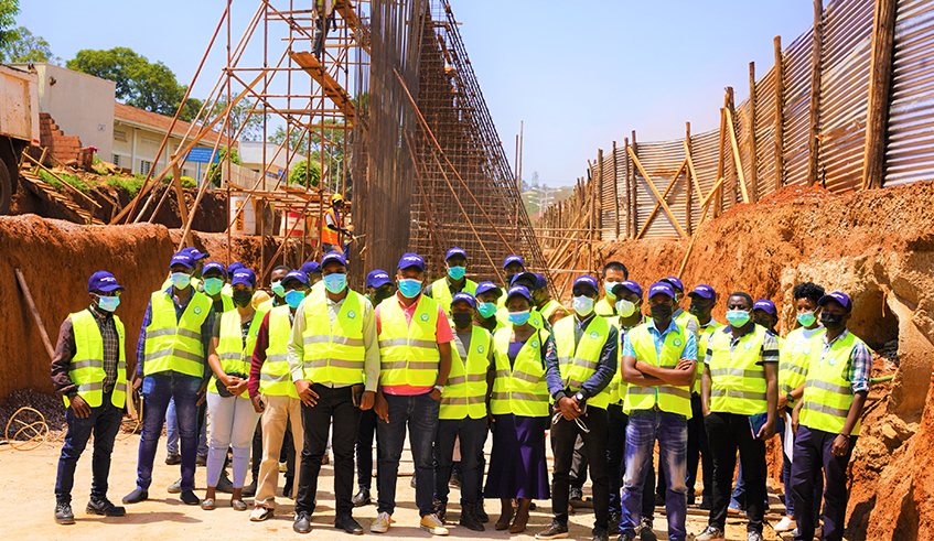 Workers on duties  where a modern flyover is being constructed as part of the ongoing Kicukiro Sonatubes-Gahanga-Akagera highway. Craish Bahizi