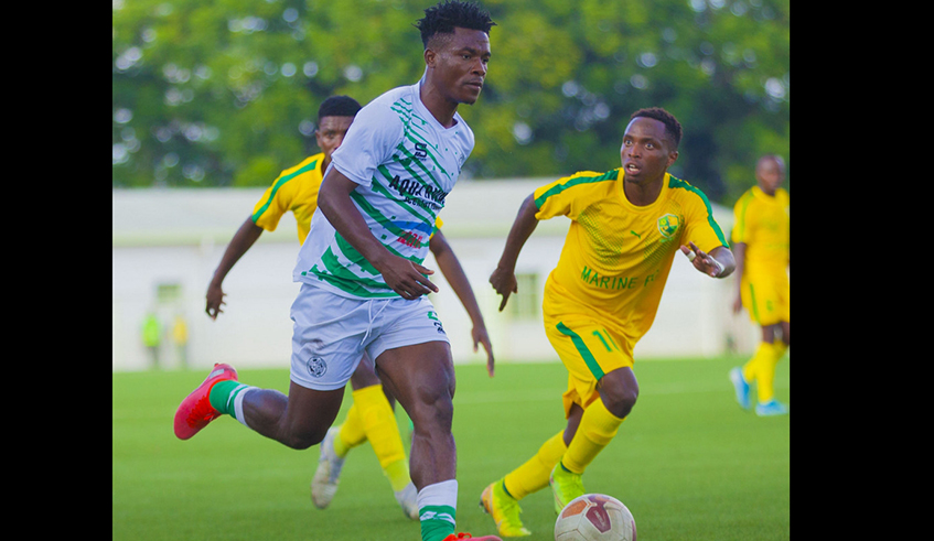 Striker Abedi Bigirimana goes past a Marine FC player at Kigali stadium in a league match last month. The Burundian international is confident Kiyovu can win the league title this season. Photo: courtesy.