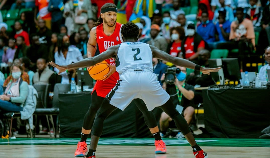 Cleveland Thomas Jr (in red) scored 16 points for REG as they suffered their first loss in the Basketball Africa League (BAL) on Friday. 