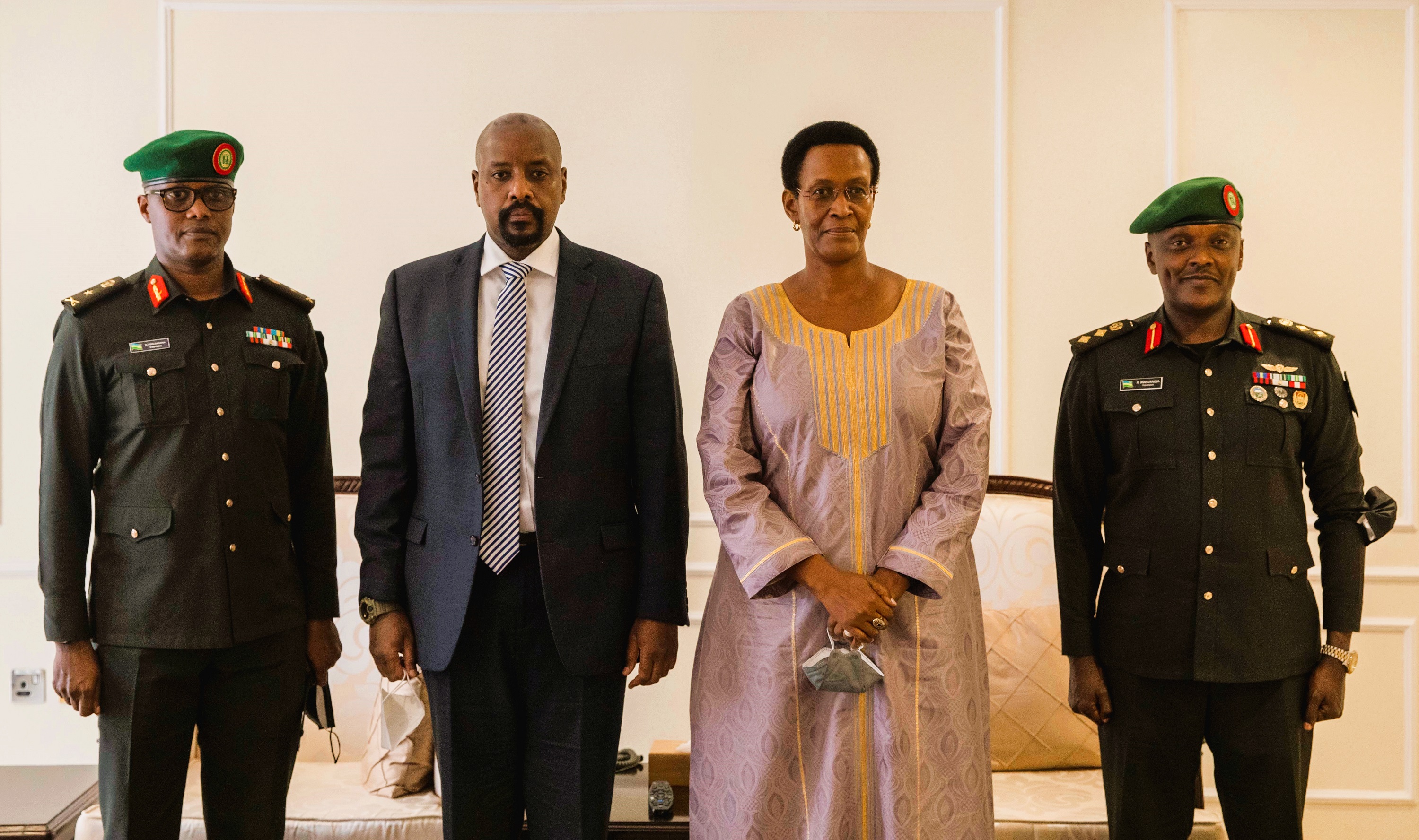 Lt. Gen. Muhoozi Kainerugaba (2nd-L) was welcomed at Kigali International Airport by Anne Katusiime (2nd-R), the Deputy Ugandan ambassador to Rwanda, Brig. Gen. Willy Rwagasana (L), the Rwandan Commandant of the Republican Guard, and Col Ronald Rwivanga (R), the Rwanda Defence Force (RDF) spokesperson. 