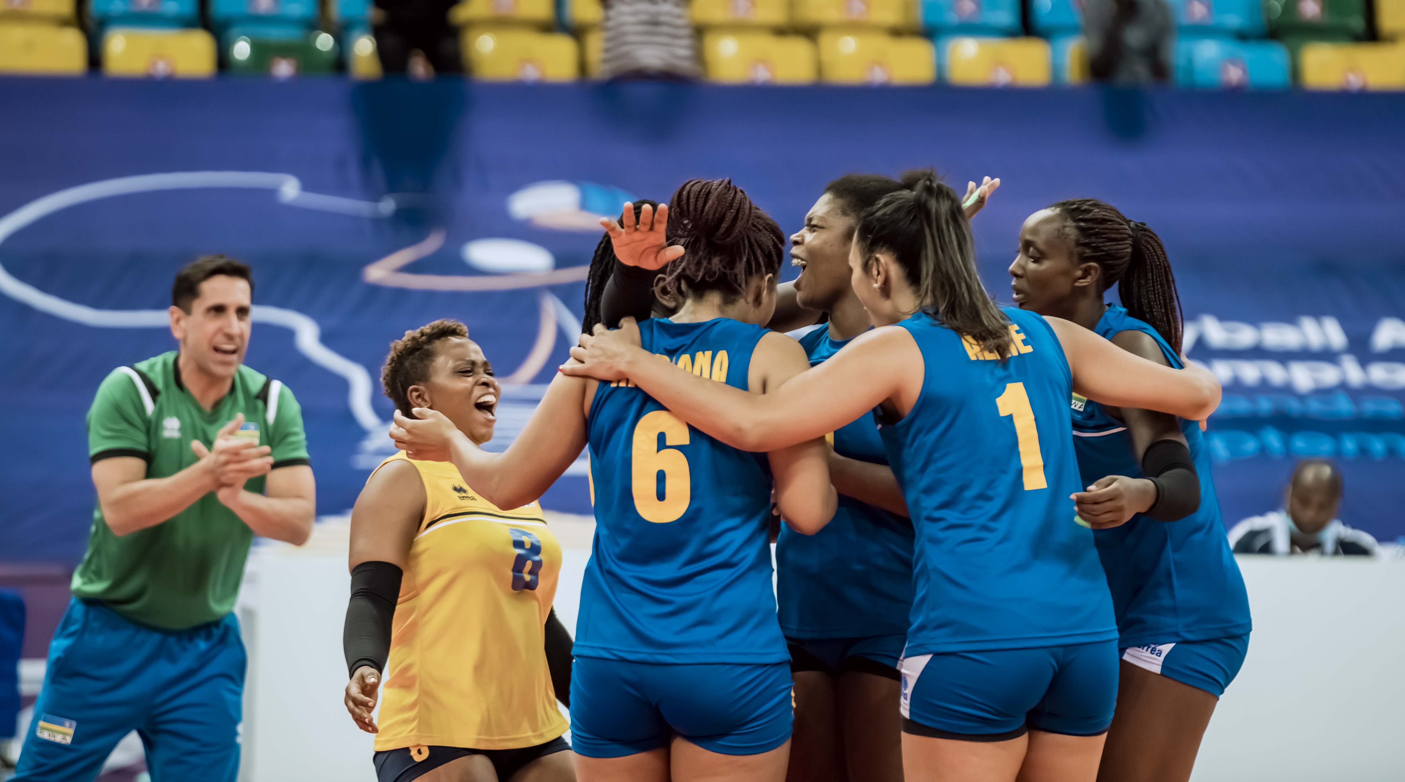 Rwandan players and head coach Paulo de Tarso (L) celebrate after scoring a point in a game against Nigeria on September 13, 2021, at Kigali Arena. File photo