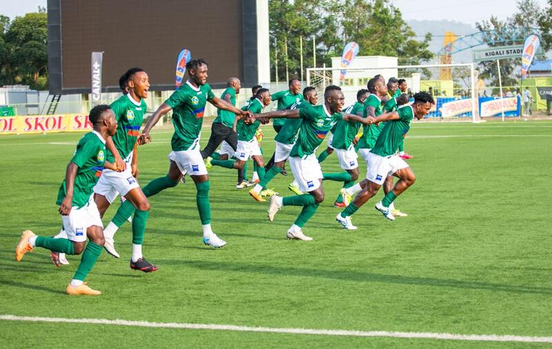 Kiyovu players celebrate after defeating Rayon Sport 2-0 at Kigali stadium on Saturday. The Green baggies top the league table. 
