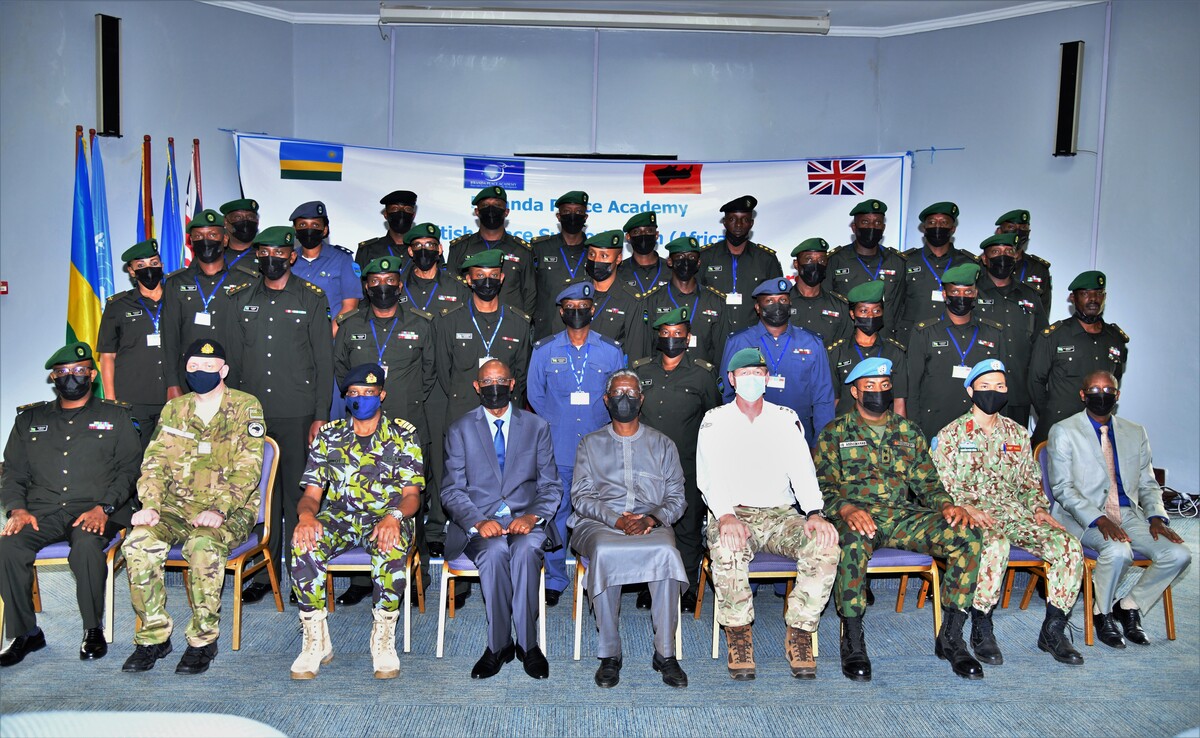 A total of 25 senior officers of the Rwanda Defence Force begin the United Nations staff officersu2019 course at Rwanda Peace Academy in Musanze on March 21, 2022. Seen here with officials and trainers in a group photo. 