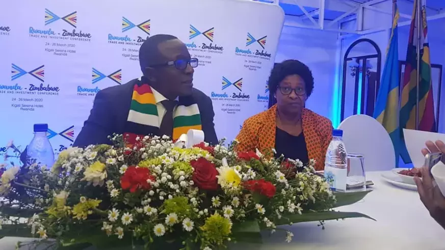 David Musabayana, Zimbabweu2019s Deputy Minister for Foreign Affairs and International Trade (left), addresses the media during the unveiling of the upcoming u2018Rwanda-Zimbabwe Trade and Investment Conference.