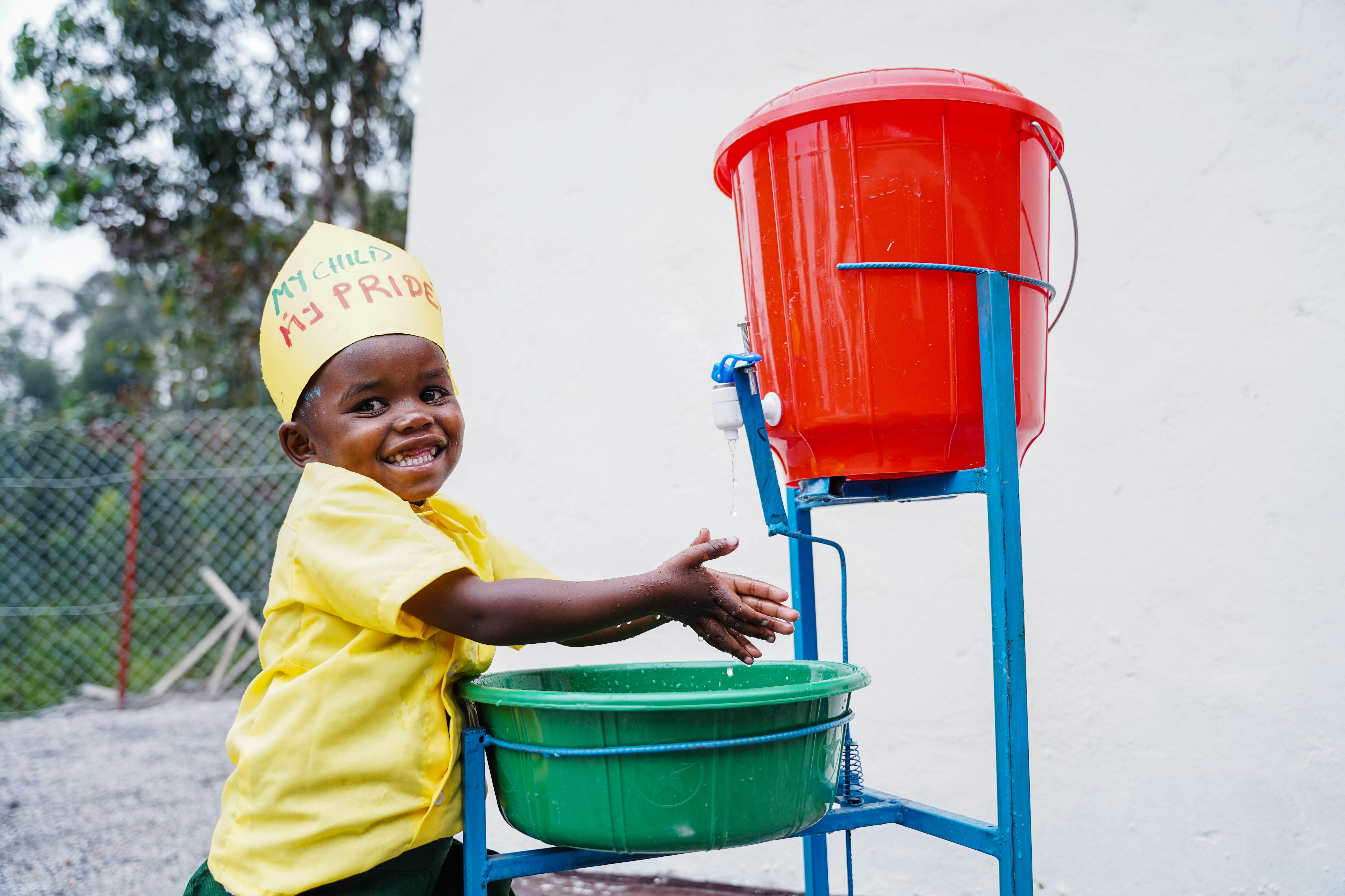 A child washes her hands at the Wolfram-run Early Childhood Development centre at Gifurwe in Burera District on Friday, March 18. 