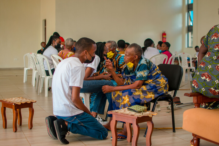 Elderly survivors whose families wiped out during the 1994 Genocide against Tutsi, interact with members of Peace and Love Proclaimers  during their visit at a facility where they live in Bugesera District on March 24. The facility is a home to 66 'Intwaza'  composed of nine men and 57 women. 