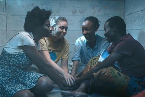 The movie is about four women from different backgrounds who forge an unbreakable bond while trapped in an underground room . / Net photos