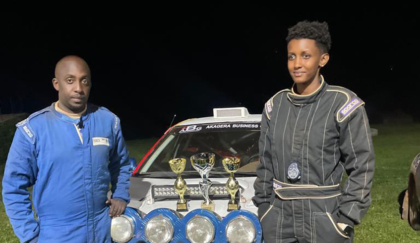 Fabrice Yoto (left) and co-driver Queen Kalimpinya pose with their trophies finishing the race during the Sprint Rally All Star 2022 on March 26 in Rwamagana District. Kalimpinya won the u2018Best Femaleu2019 and u20184th Co-Driveru2019 awards. / Photo: Courtesy.