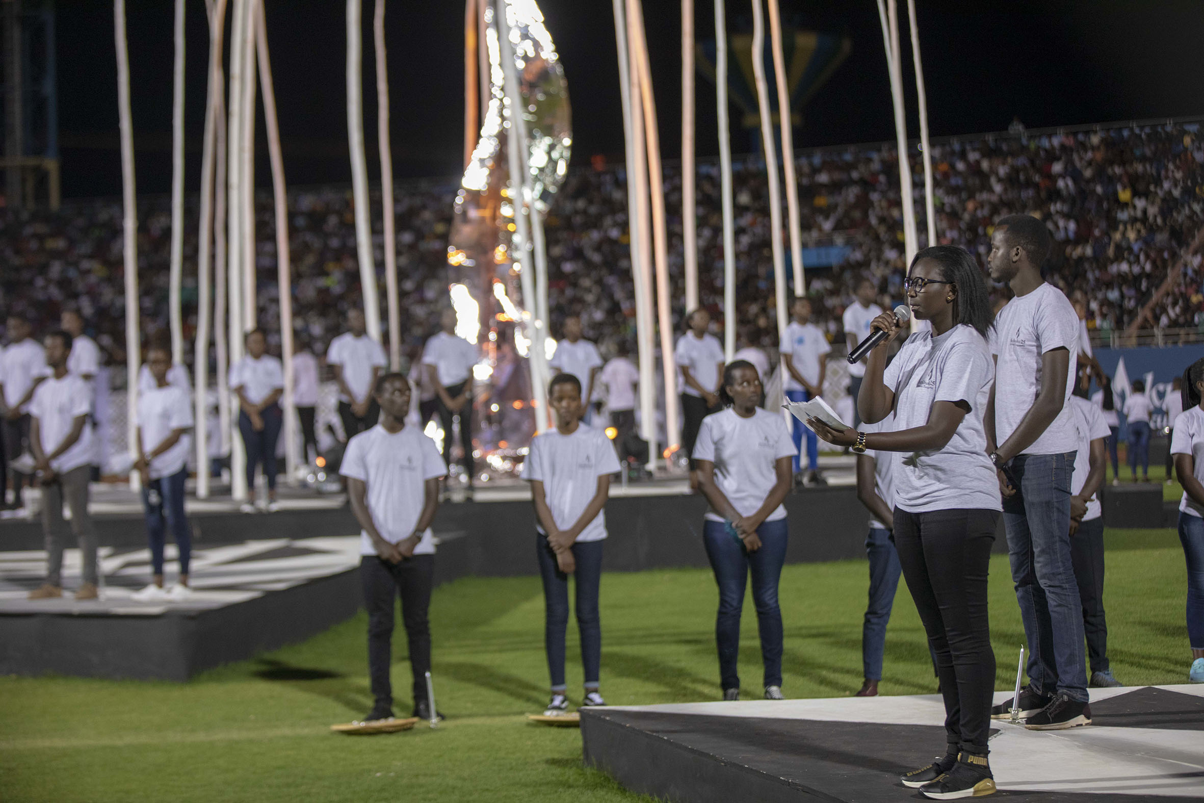 Mourners during a commemoration event at Amahoro National Stadium on April 7, 2019. According to MINIBUMWE, there will be no Walk to Remember on April 7, while the night vigil will be aired on national television.  Photo: Sam Ngendahimana.